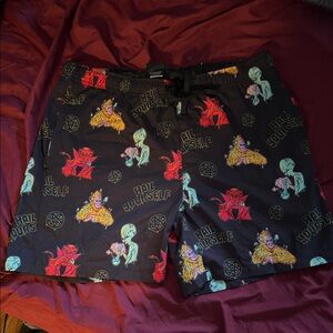 Last Podcast On The Left swim trunks